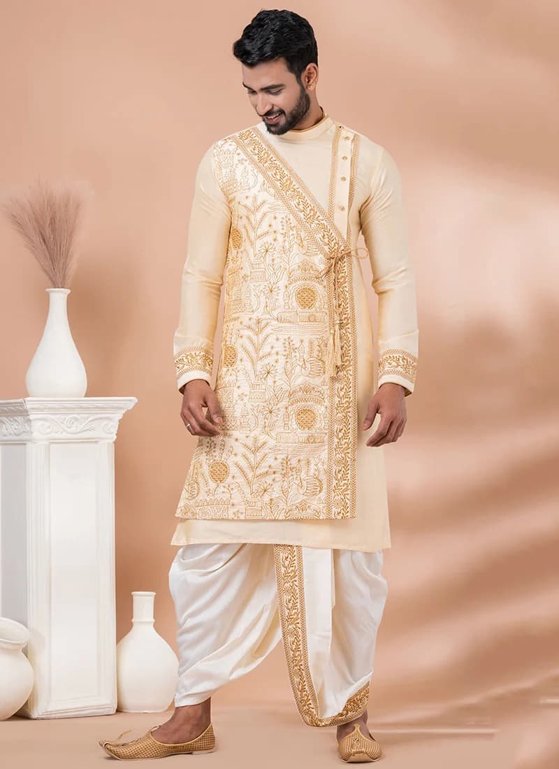 Model in a cream embroidered kurta with dhoti pyjama